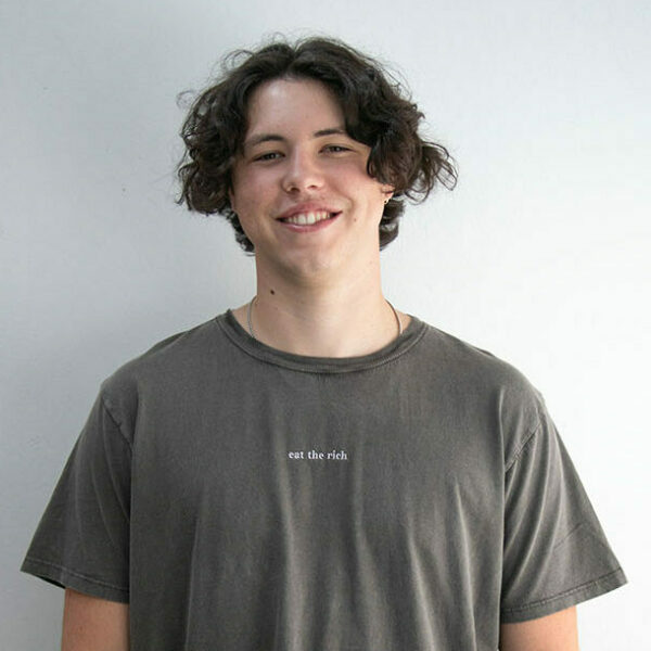 eat the rich Tshirt by <a href="https://schwupp.cool/artist/k/" style="color:#e288a0;text-decoration: underline;">K</a>